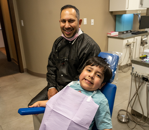 Child receiving fluoride treatment