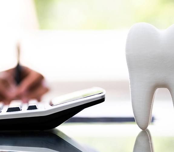 Calculator and a tooth in Channahon