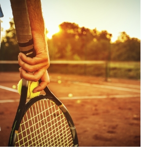 Person holding a tennis racket