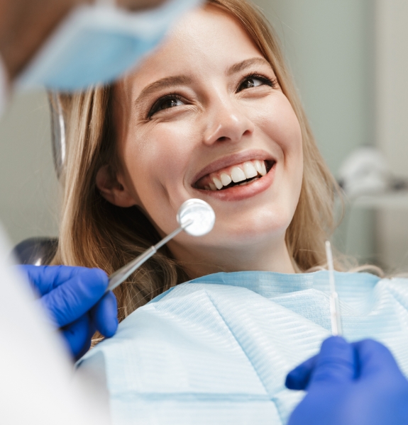 Woman smiling at dentist