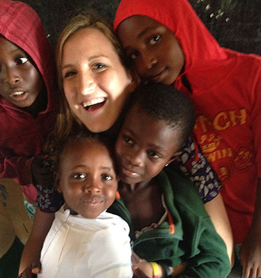 Dr Resek with children from one of her trips