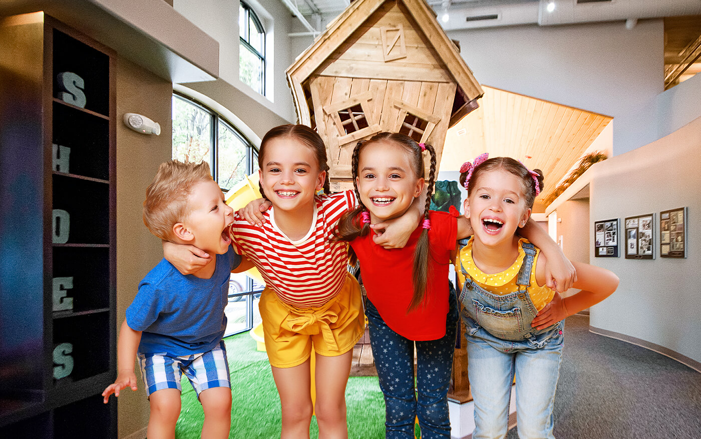 Group of smiling kids in Channahon dental office