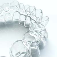 Closeup of Clear Aligners in Channahon on white background