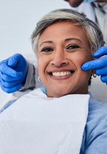 a patient visiting her dentist near Minooka