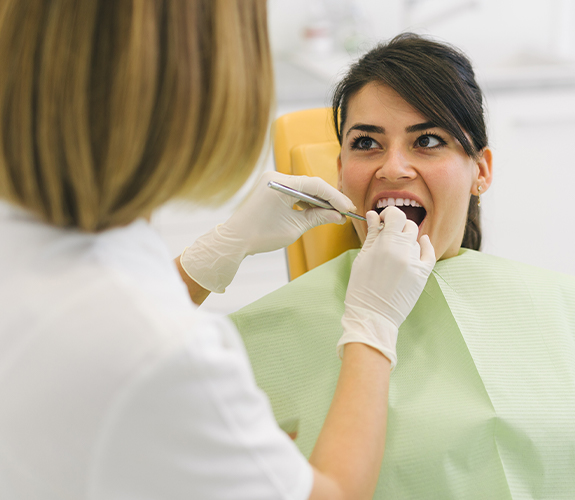 Patient receiving scaling and root planing periodontal treatment