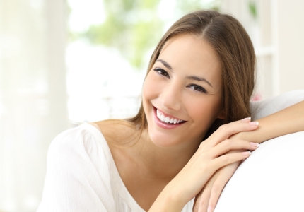 Woman with gorgeous smile after cosmetic dnetistry
