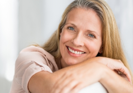 Woman sharing healthy smile after periodontal therapy