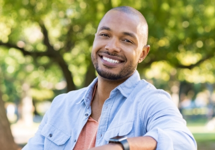 Man sharing healthy smile after preventive dentistry