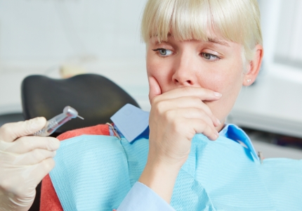 Patient in need of sedation dentistry fearful during dental treatment