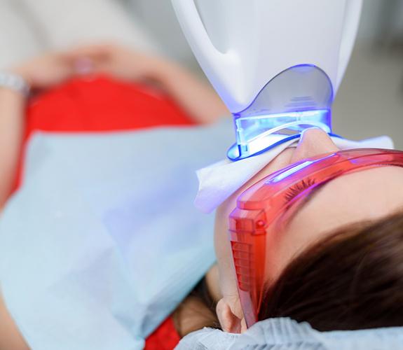 Person receiving in-office teeth whitening